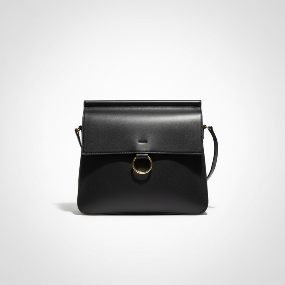 Karla Hanson Black Leather Handbag with Silver Ring Accent